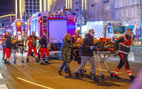 At least 2 dead and dozens injured after car plows into German Christmas market, authorities say